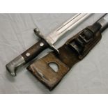 A Swiss bayonet in steel and leather scabbard No. 20994.