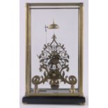 A brass 8-day skeleton clock, with enamelled numerals,