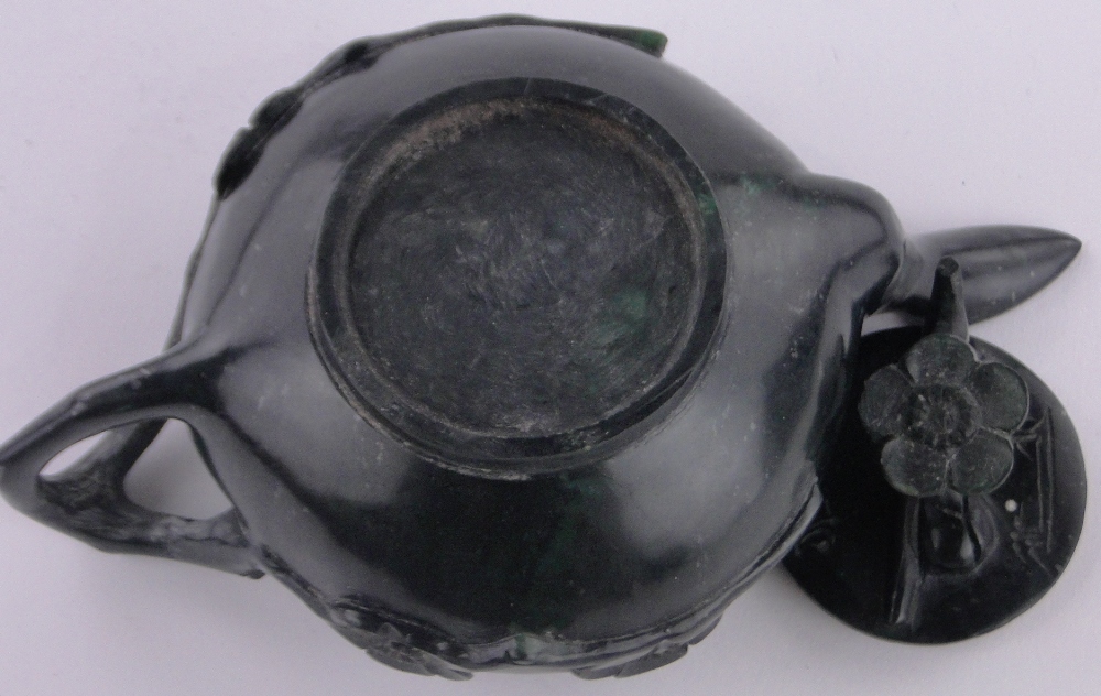 An Oriental relief carved black stone teapot, with carved floral knop, length 17cm. - Image 3 of 3