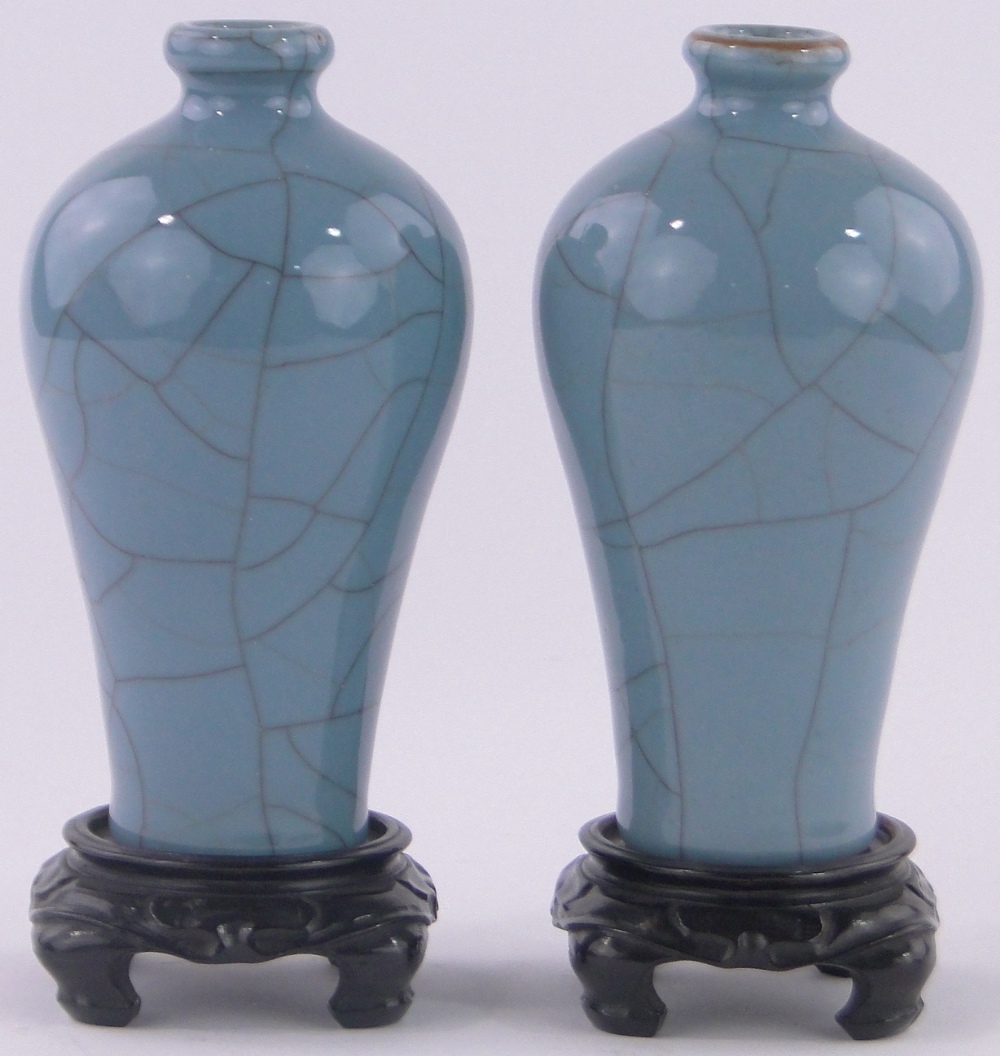 Pair of Chinese blue crackle glaze porcelain narrow necked vases,