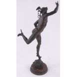 A 19th century patinated bronze sculpture of Mercury, unsigned on circular red marble plinth base,