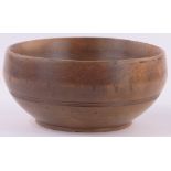 An English turned fruit wood bowl, diameter 19cm.