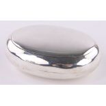 An Edwardian oval silver tobacco box, sprung hinged lid, Chester 1911, length 7.5cm.