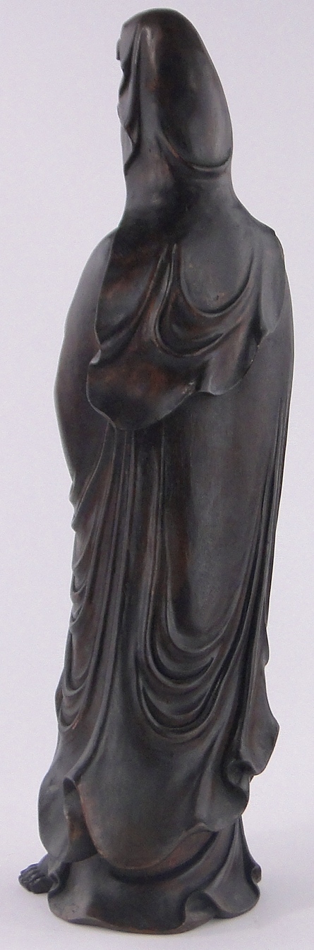 A Chinese carved and stained wood figure of Guanyin, height 60cm. - Image 2 of 3