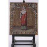 An Antique Russian painted and gilded icon on wood panel, depicting a female saint,