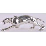 A silver plated prowling panther, length 18cm.