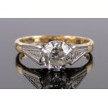 A 0.8ct solitaire diamond ring, 18ct gold and platinum settings, size N.