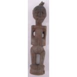 An African carved and painted wood tribal figure, height 64cm.