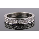 An 18ct white gold diamond half eternity ring, total diamond content approx. 1ct, size S, 6.6g.