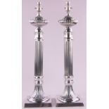 Pair of large electroplate table lamps with fluted columns, height 60cm.