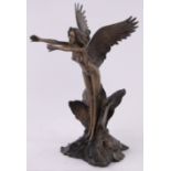 A reproduction bronze figure of a naked angel, height 35cm.