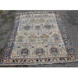 A blue and cream ground Persian design rug, 7'7" x 5'.