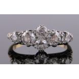 An 18ct gold 6 stone diamond cluster ring, circa 1920, total diamond content approx.