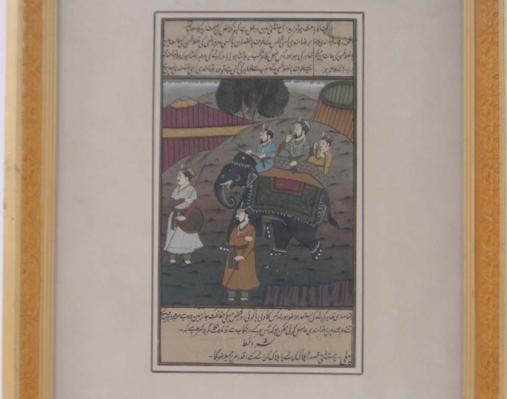 An Indian/Mughal gouache painting on paper, depicting elephant riders, with text inscription,