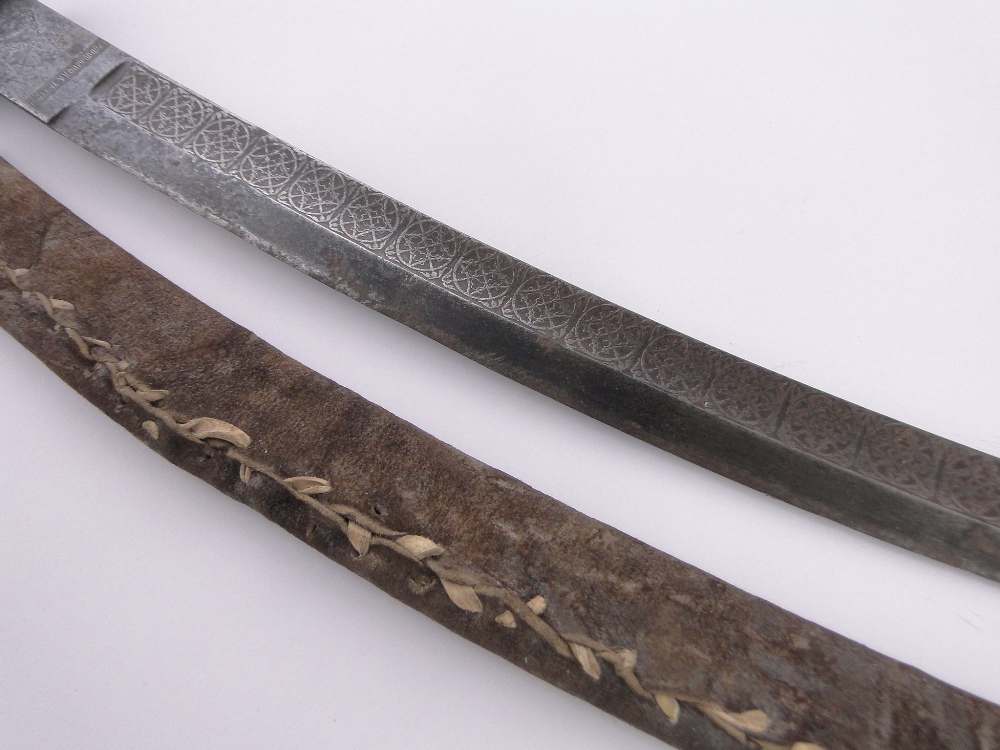 An Ethiopian curved sword, 18th/19th century, the blade having embossed portrait and text, - Image 3 of 4