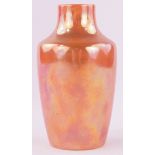 A Ruskin Pottery vase, orange lustre glaze, impressed marks dated 1915, height 15cm.
