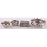 A group of Indian silver items, including a relief decorated circular bowl, 13cm diameter, (4).