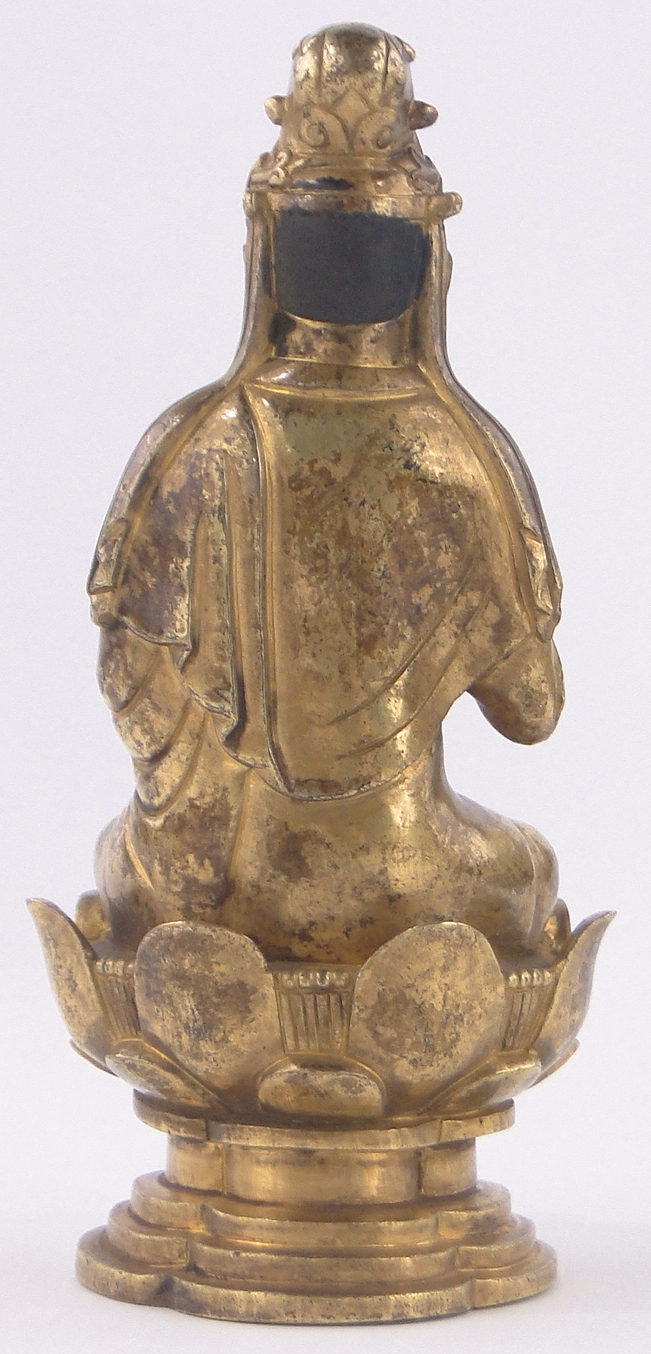 A Chinese gilt bronze seated figure of Guanyin, seated in a lotus flower, unsigned, height 18cm. - Image 2 of 3