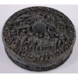 A 19th century Chinese relief carved tortoiseshell circular snuff box, diameter 9.5cm, a/f.