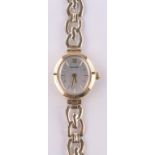 A lady's Accurist 9ct gold cased quartz wristwatch, 9ct strap, case width 16mm, boxed,