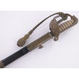 An early 20th century Navy Officer's dress sword, shagreen handle with gilt brass basket hilt,