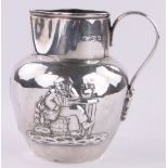 A Victorian silver cream jug, with relief embossed country figures, Birmingham 1893, height 10.5cm.