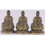 3 Chinese gilt bronze seated Buddha figures, height 20cm.