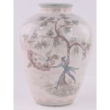 A large German 20th century ceramic vase, hand painted design depicting a girl on a swing,