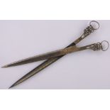 A pair of Turkish gold inlaid calligraphy scissors, with pierced brass handles, length 27.5cm.