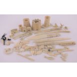 A collection of ivory and bone carvings, including 19th century ivory vinaigrette,