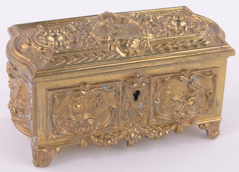 An ornate Victorian relief cast gilt bronze casket, Commemorating Victoria's Diamond Jubilee,