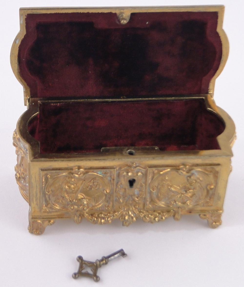 An ornate Victorian relief cast gilt bronze casket, Commemorating Victoria's Diamond Jubilee, - Image 3 of 5