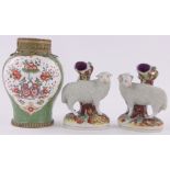 A pair of 19th century Staffordshire Pottery sheep spill vases,