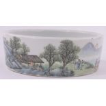 A Chinese porcelain brush washer pot, hand painted landscape scenes with painted seal mark,