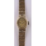 A lady's 9ct gold cased Rotary mechanical wristwatch, 17 jewel movement with 9ct textured strap,