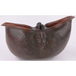 An African Suku Congo carved and stained wood ritual bowl, length 36cm.