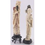 2 19th century Chinese carved ivory figures, both height 25cm on carved hardwood stands.