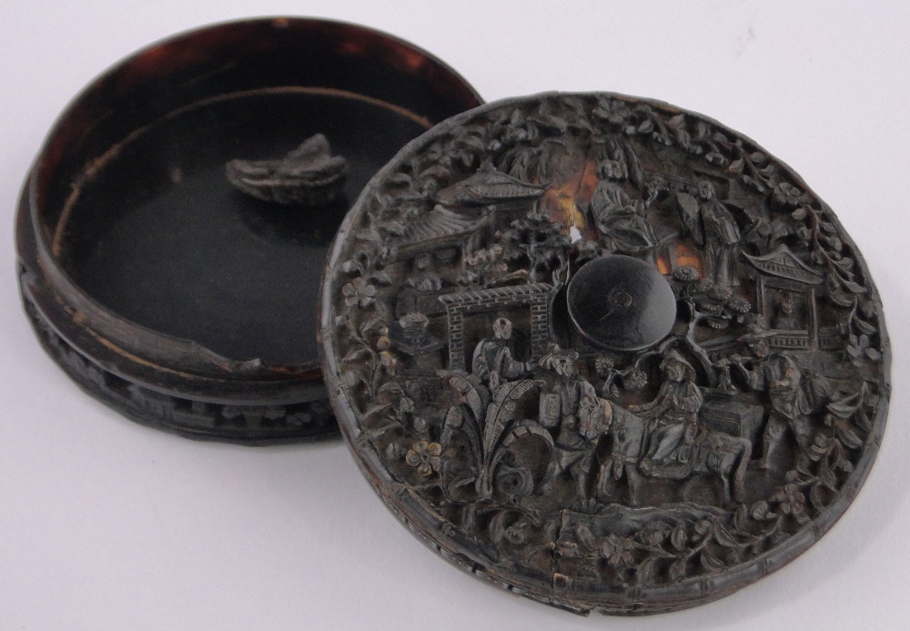 A 19th century Chinese relief carved tortoiseshell circular snuff box, diameter 9.5cm, a/f. - Image 2 of 3