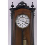 A 19th century walnut cased Vienna regulator wall clock, carved pediment and finials,