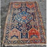 A cream ground Hamadan rug with symmetrical pattern, 6' x 4'.