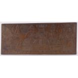 An African tribal relief carved hardwood wall plaque, 74cm x 32cm.