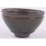 A Chinese blue/brown slip glazed pottery bowl, diameter 12cm, height 7cm.