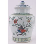 A large Chinese porcelain jar and cover, painted enamel pomegranate design, height 39cm.