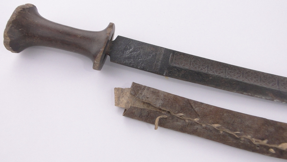 An Ethiopian curved sword, 18th/19th century, the blade having embossed portrait and text, - Image 2 of 4