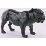 A patinated bronze life size Bulldog, length 80cm.