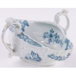 An early English Worcester porcelain 2-handled double lipped sauceboat,