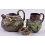 A Rye Pottery Hop Ware teapot, diameter 12cm, (no lid, handle restored), a small Hop Ware jug,