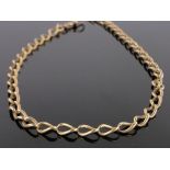 A 9ct gold solid curb-link watch chain, 36.5g, length 44cm.