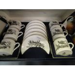 A Royal Worcester coffee set with bird decoration in presentation box.