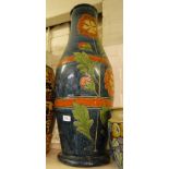 A large continental incised and painted pottery vase.